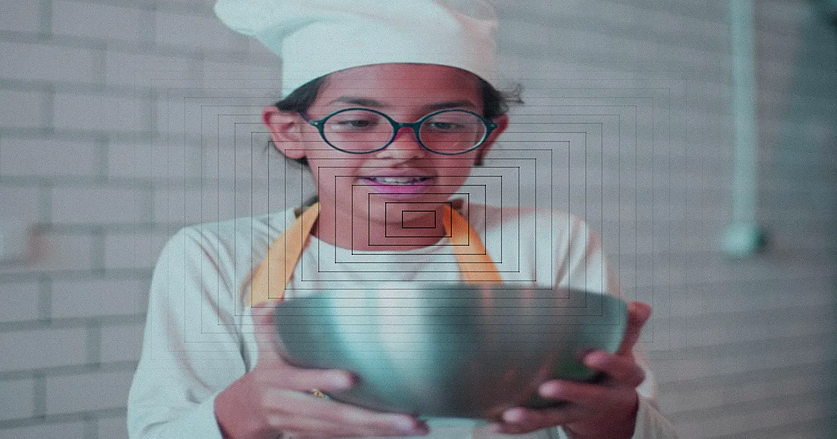 Crianças aprendendo a cozinhar em uma aula de culinária divertida.